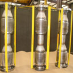Universal expansion joints with travel rods
